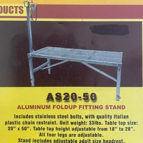 AS20-50 aluminum fold-up fitting stand with perforated platform and chain, shown on a yellow advertisement background.